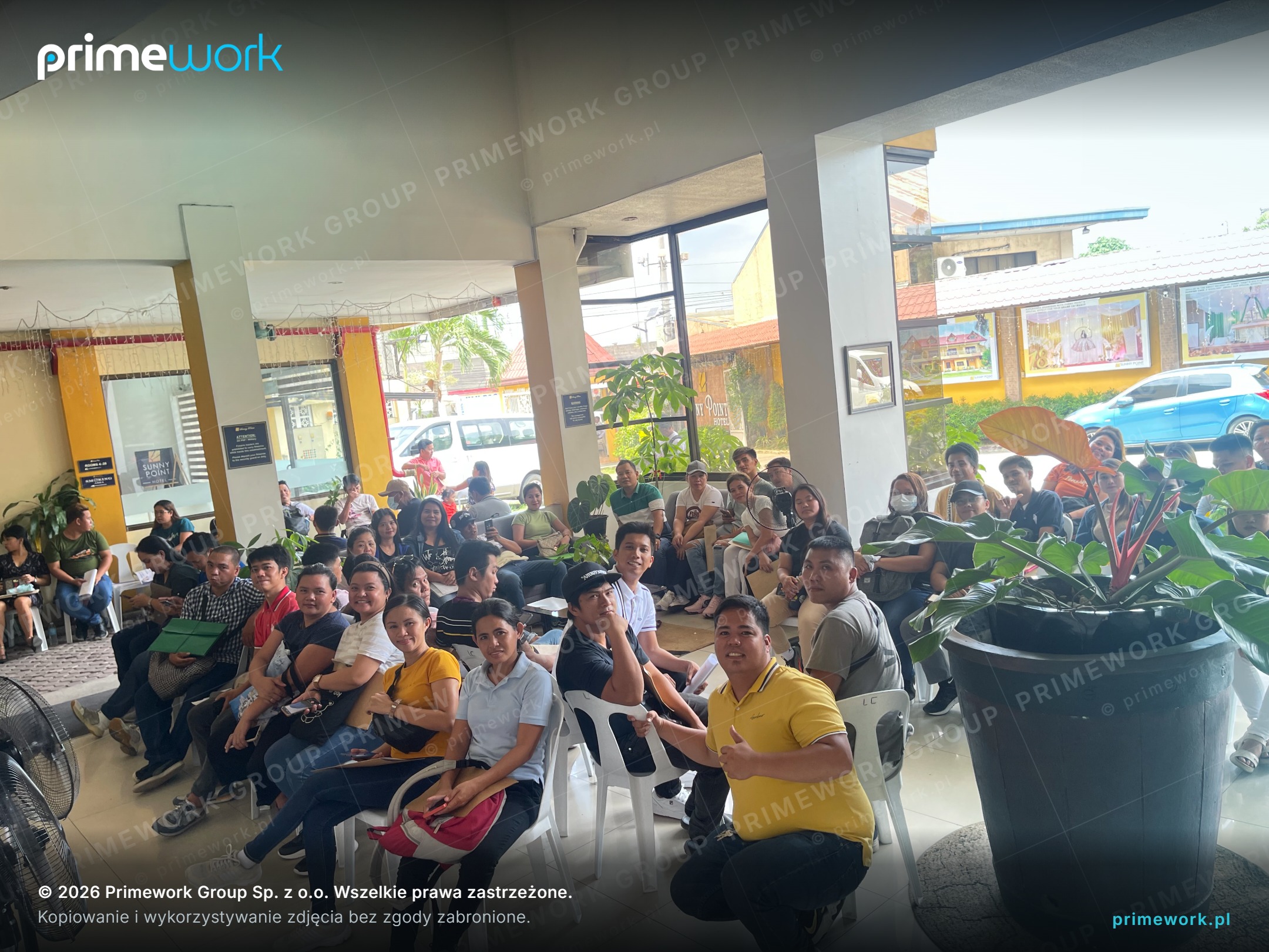 A full waiting room at a recruitment office during a hiring drive